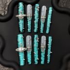 Teal Chrome Cross Press-On Nails with Studs and Planet Charm